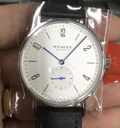 245usd for nomos watch